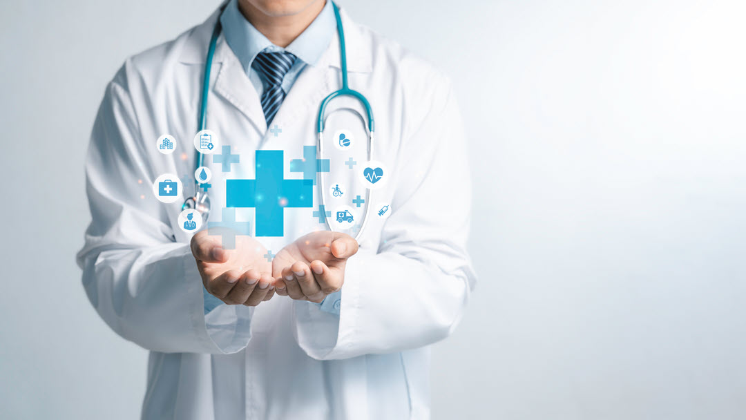 provider holding medical images in hands